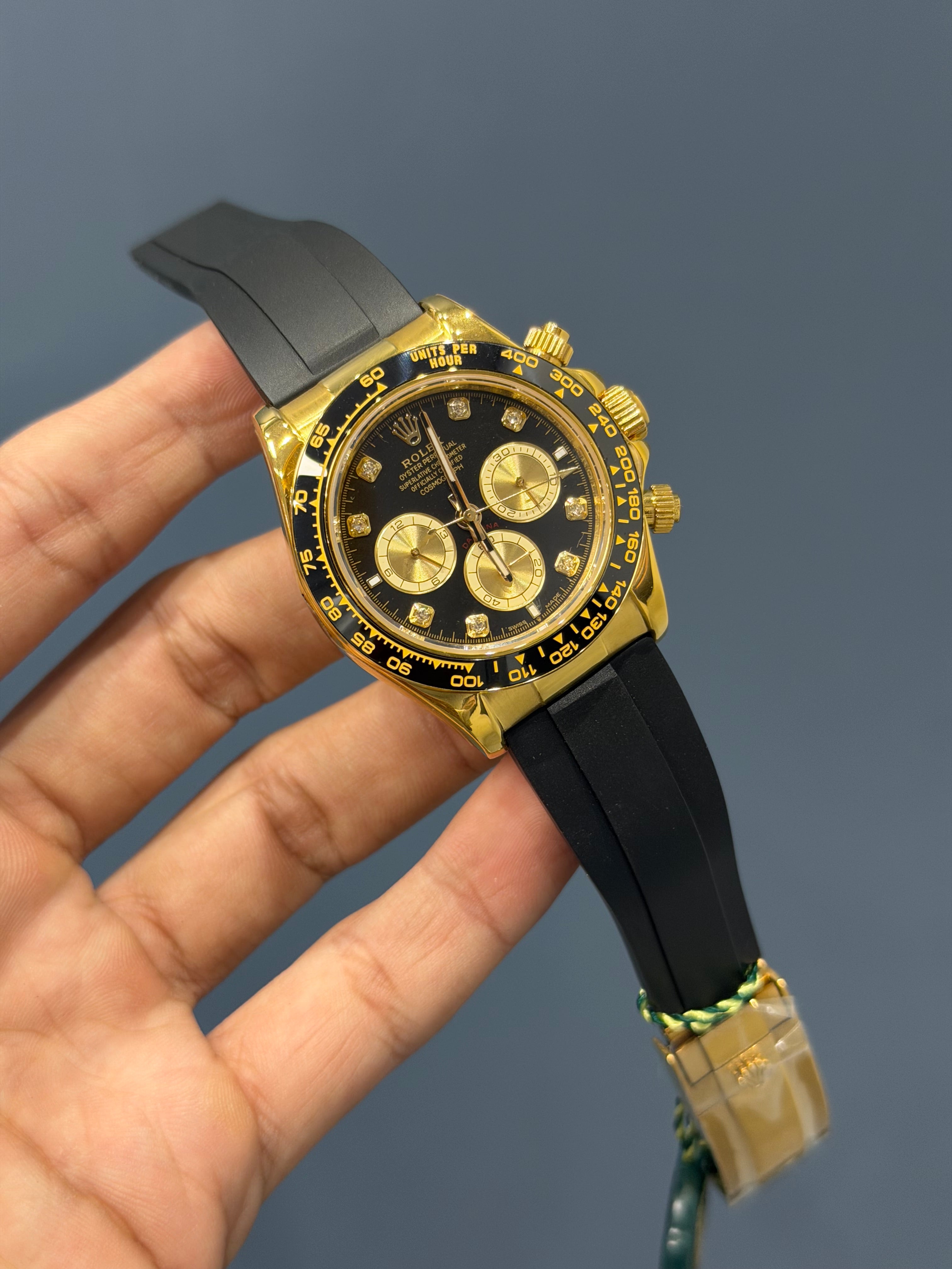 NEW COLLECTION CHRONOGRAPH 40 YELLOW GOLD CASE WITH BLACK DIAL & RUBBER STRAP